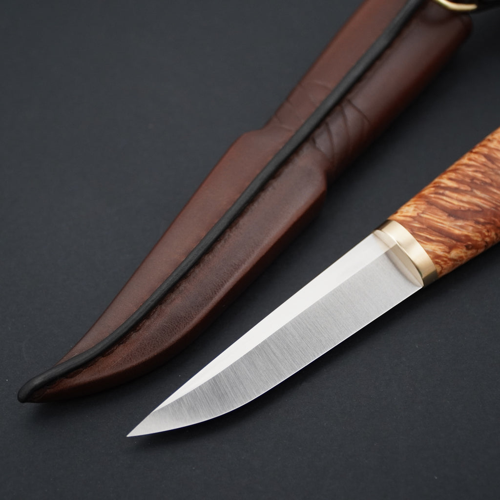 Puukko, Magnacut, stabilized X-cut curly birch