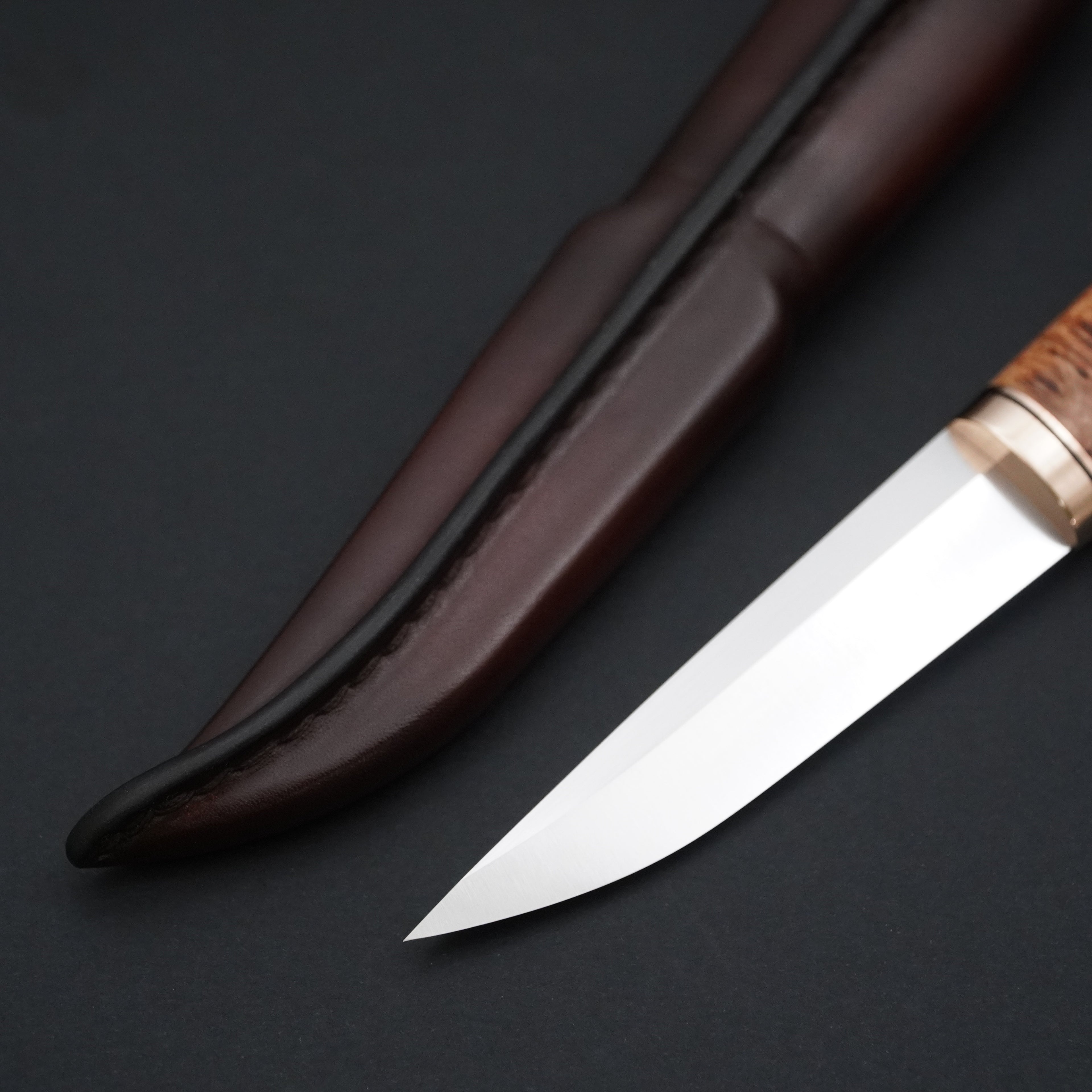 Puukko, lehmuksen juuripahka